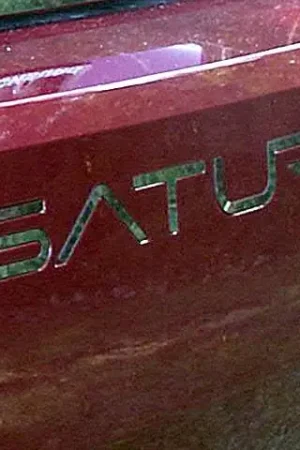 Brand New SATURN ION 4dr QAA Stainless 5pcs Graphic/Logo/emblem SGR45410