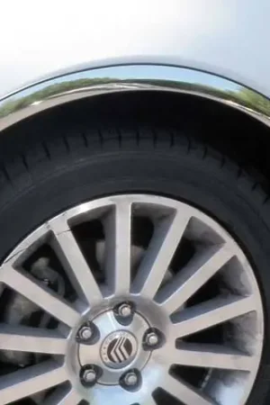 ZEPHYR 4dr QAA Molded Stainless 4pcs Wheel Well Fender Trim WZ46630 Save Now