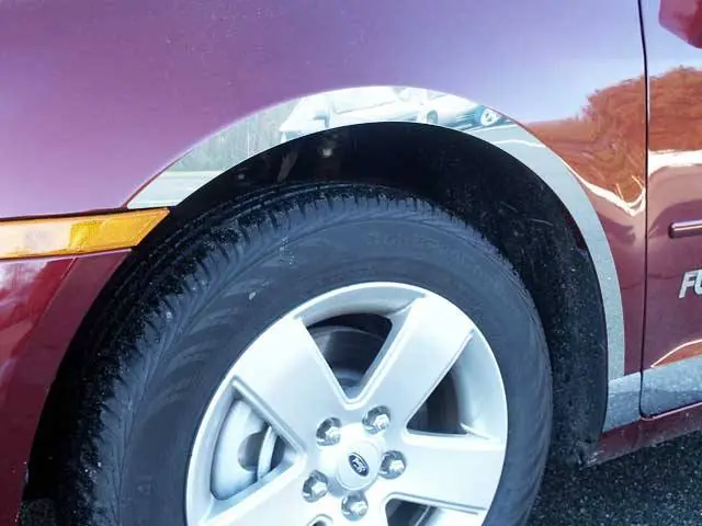 Professional Grade MERCURY MILAN 4dr QAA Stainless 4pcs Wheel Well Accent WQ46630