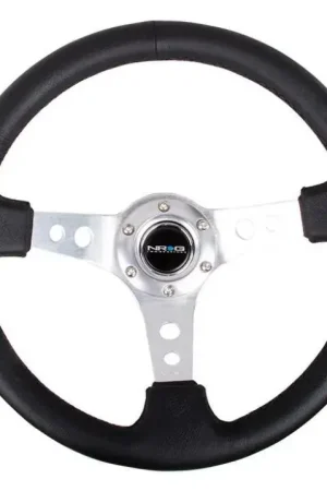 Shop Now NRG NRG Reinforced Steering Wheel (350mm / 3in. Deep) Blk Leather w/Silver Spoke & Circle Cutouts